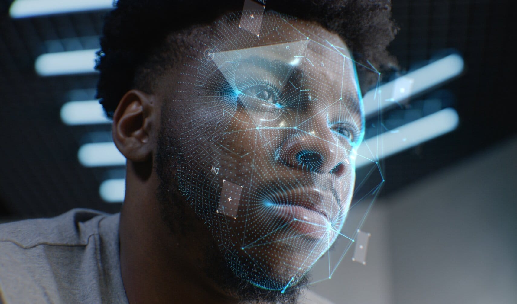 Facial recognition mesh mapping a man's face during biometric identity verification