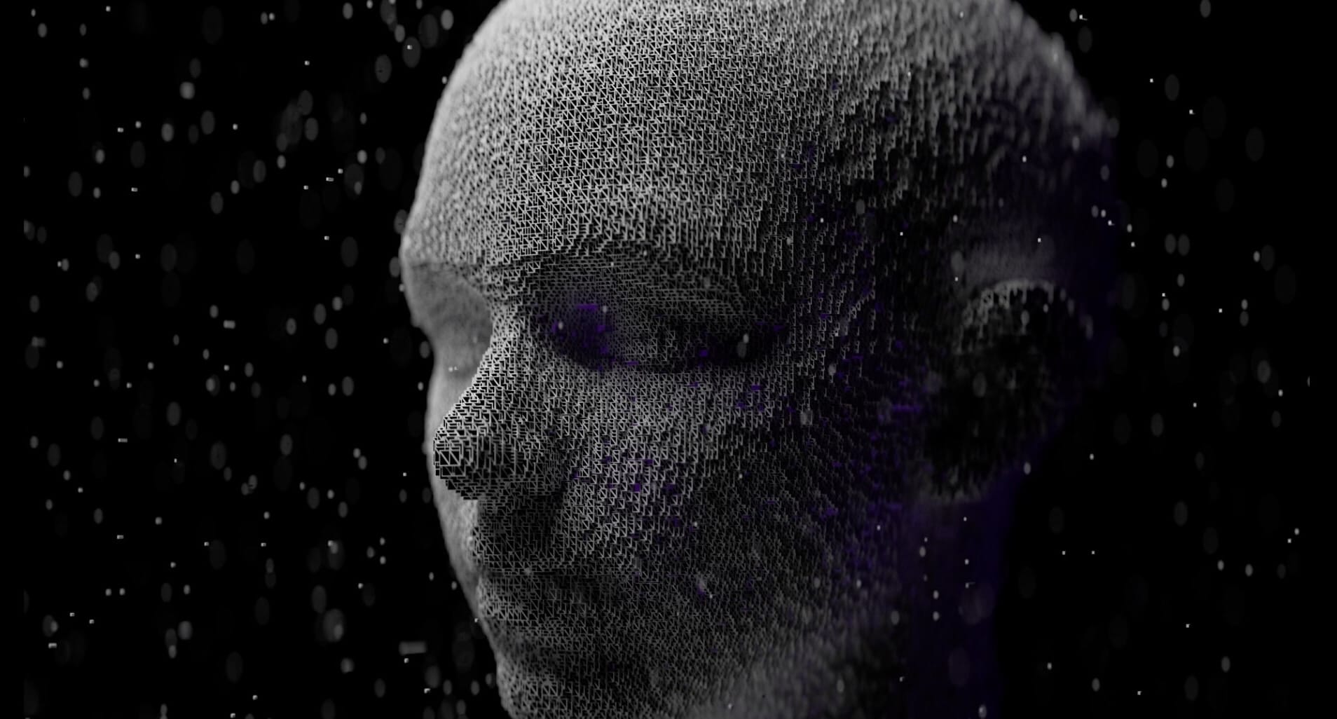 Digital wireframe human head in profile on a dark background