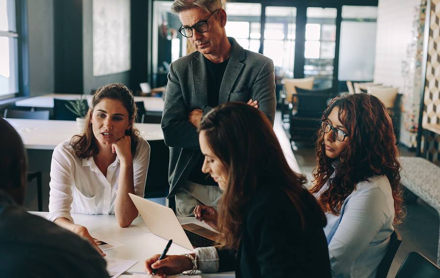 A group of employees brainstorming