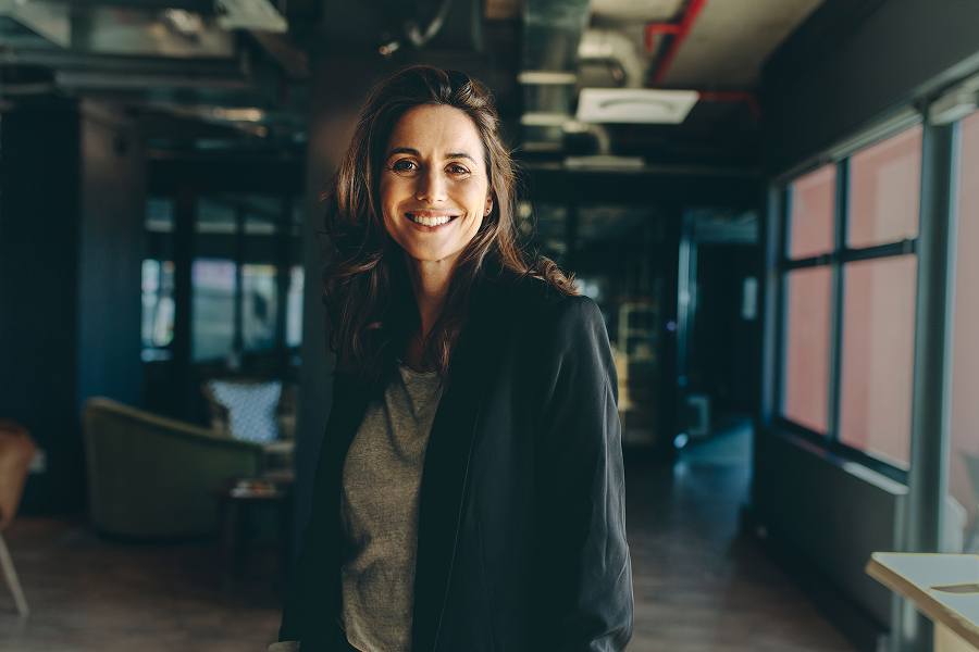 A female employee smiling
